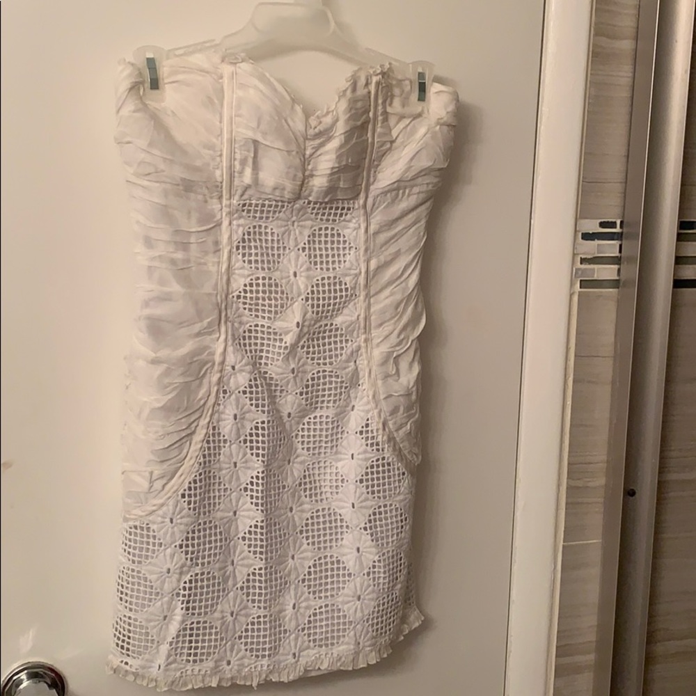 Xs BEBE ruffled strapless dress.